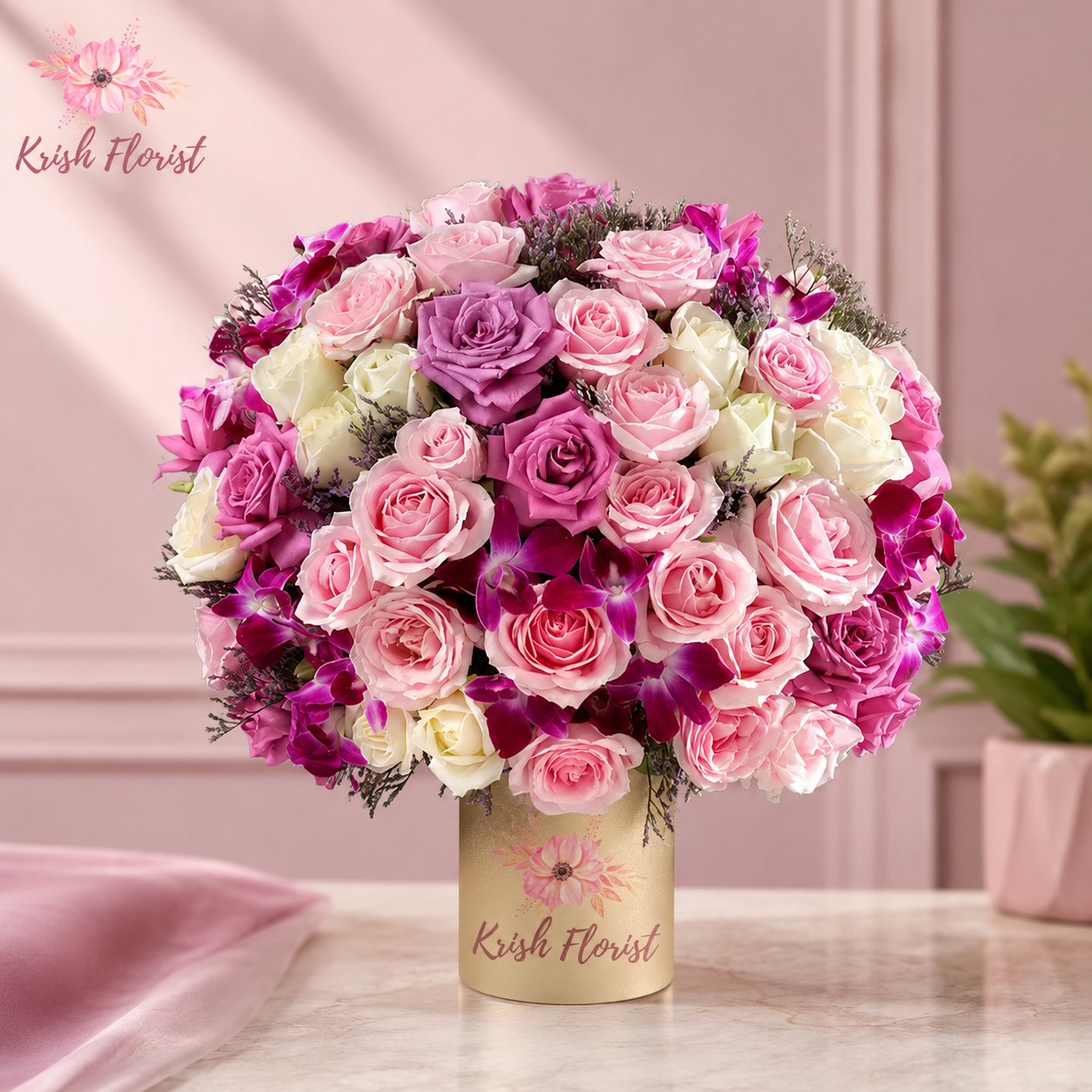 Premium pink roses, delicate lavender flowers and elegant white orchids arranged in a stylish luxury flower box. A beautiful choice for romantic gifting, birthdays, anniversaries and celebrations, available for flower delivery in Delhi from Krish Florist.
